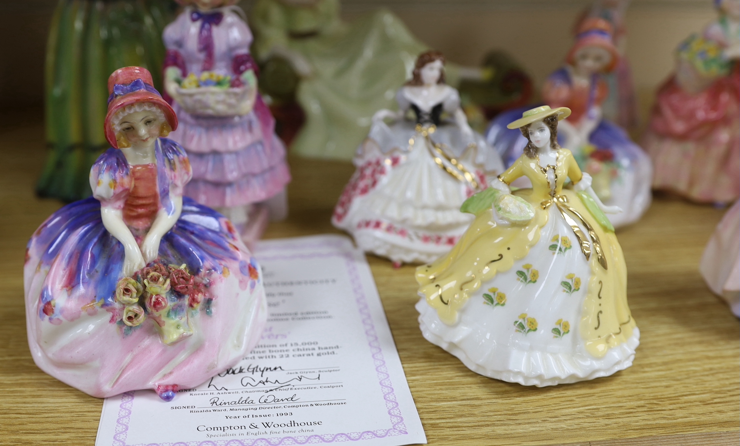 A mixed group of Royal Doulton and Coalport figures and a German figurine, the largest 20cm high